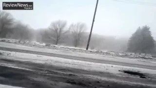 Ukraine War   Russian T 72 tanks & trucks on the road to Vuhlehirsk near Debaltseve