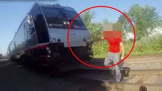 Bodycam Footage Shows Police Officer Save Man Just Seconds Away From Being Hit By Train