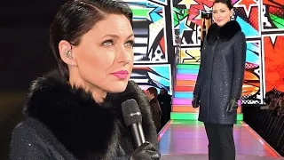 Emma Willis looks picture perfect in sequinned coat and chic cigarette trousers as she presents CBB