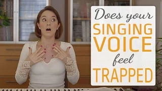 Why does your singing voice feel trapped or stuck?