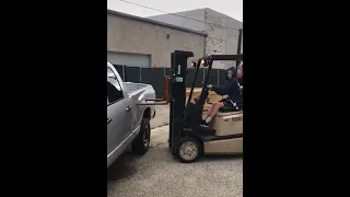 KID DRIVING FORKLIFT TRUCK CRASHES INTO TRUCK