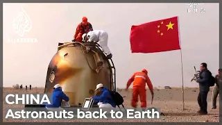 Chinese astronauts return to Earth after six months in space