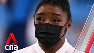 Outpouring of support after US gymnast Simone Biles exits 2 Olympic events