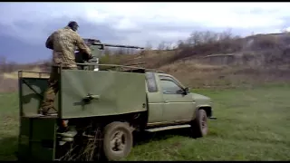 Бійці ОТГ ДУК "Правий сектор" випробовують важкий кулемет