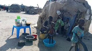 Primitive African village life of  a single mother//African village life