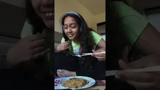 Eating noodles with chopsticks for first time 🤣