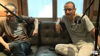 Chester Bennington catches fainting camerawoman