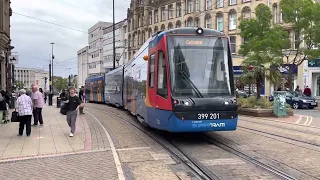 Tram Train switching tracks at Sheffield Cathedral - 21 July 2022