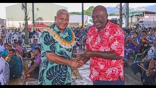 Fijian Prime Minister hands over Lease Security Bonus Payout to landowners of Fiji Pine Limited.