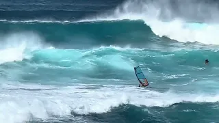 Windsurfing beating, rough day at the office. Hookipa Maui extreme windsurf action.