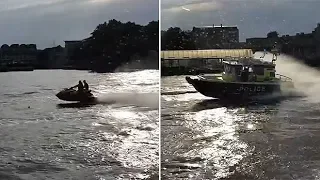 Police pursue speeding Jet Ski riders on the Thames