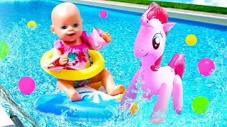 Baby Annabell doll at the beach! Baby dolls in swimsuit at the water park & swimming pool for kids