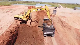 EXCAVATOR LOADING TRUCKS! (CAT 320 CL)