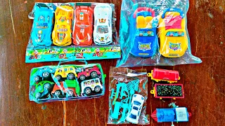 A small packages of toy cars. 4 Race cars, trains,Plastic gun, small bag of toy cars.