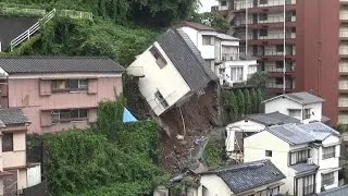 Mudslide destroys home in Japan