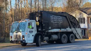 Robertson sanitation: Mack LE mcneilus rear loader garbage truck