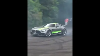 Mercedes AMG GTR PRO doing donuts at Goodwood Festival