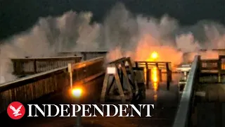 Storm Nicole: Moment 18ft wave dwarfs fishing pier