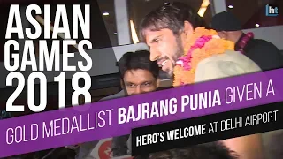 Gold medallist Bajrang Punia given a hero's welcome at Delhi airport