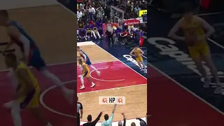 Kristaps Porzingis dunks on lebron James