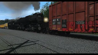 Union Pacific 4014 pushes a stalled Freight Train in Trainz!