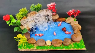 Fish in Waterfall from Hot glue gun, clay and cardboard || Showpiece for home decoration.