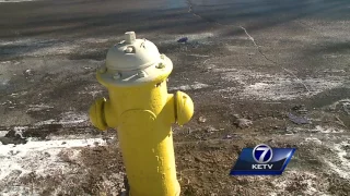 Crews smash windows of car blocking hydrant
