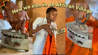 How we iron clothes in an African Village / old school way