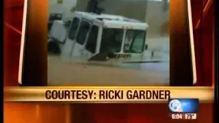 Dump truck stuck in sinkhole