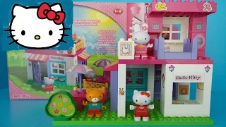 HELLO KITTY EN HAAR VRIENDJES BOUWEN EEN HUIS VAN DUPLO