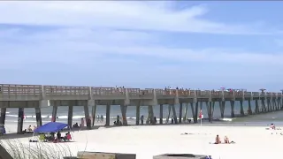 Witnesses describe gunfire on the beach