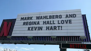 Mark Wahlberg & Regina Hall Love Kevin Hart! Billboard Sunset Blvd LA CA USA September 3, 2022