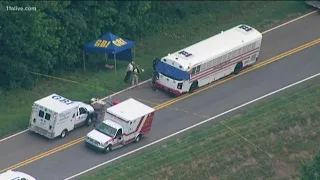 Inmates who witnessed escape, killing of guards during bus transport now suing Georgia