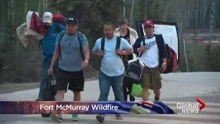 Fort McMurray wildfire: Fleeing residents describe 'never-ending evacuation' as fire grows