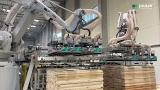 Stacking layers of wood with ExtriGrip Grippers on 2 robots mounted in parallel