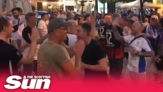 Rangers and Frankfurt fans hug after joint singalong ahead of crunch Europa League final