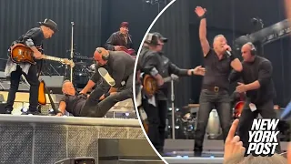 Bruce Springsteen falls on stage, band rushes to help after wipeout | Page Six