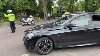 Large medical grade oxygen tanker escorted by police cars and motorcycles