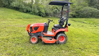 Kubota bx23s mowing tall grass with 60 inch ￼￼belly mower
