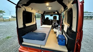 Car camping quietly alone in a light car