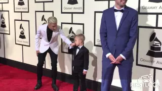 Justin Bieber and Jaxon Bieber arrive at the 58th GRAMMY Awards in Los Angeles