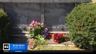 Flowers laid at the grave of Emmett Till 68 year after his brutalized body was found in a river