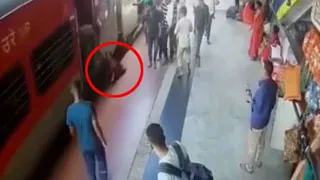 Video: Woman Slips, Gets Dragged By Train, Saved By Alert Cop