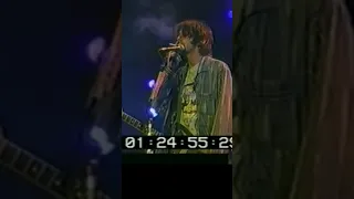 Kurt Cobain smoking and singing