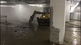 Concrete slab cutting with radio-control demolition robot