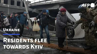 No safe corridor, just a plank for those fleeing to Kyiv | AFP