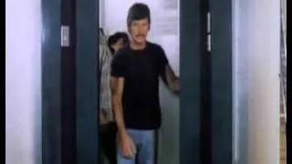 Charles Bronson operates the elevator of pain