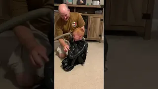 Dad Vacuum Seals Kid in Garbage Bag - 1050552