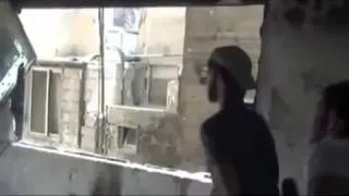 FSA Rebel hit by Syrian Army sniper