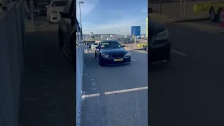 The sound of a BMW 550i V8 drive by